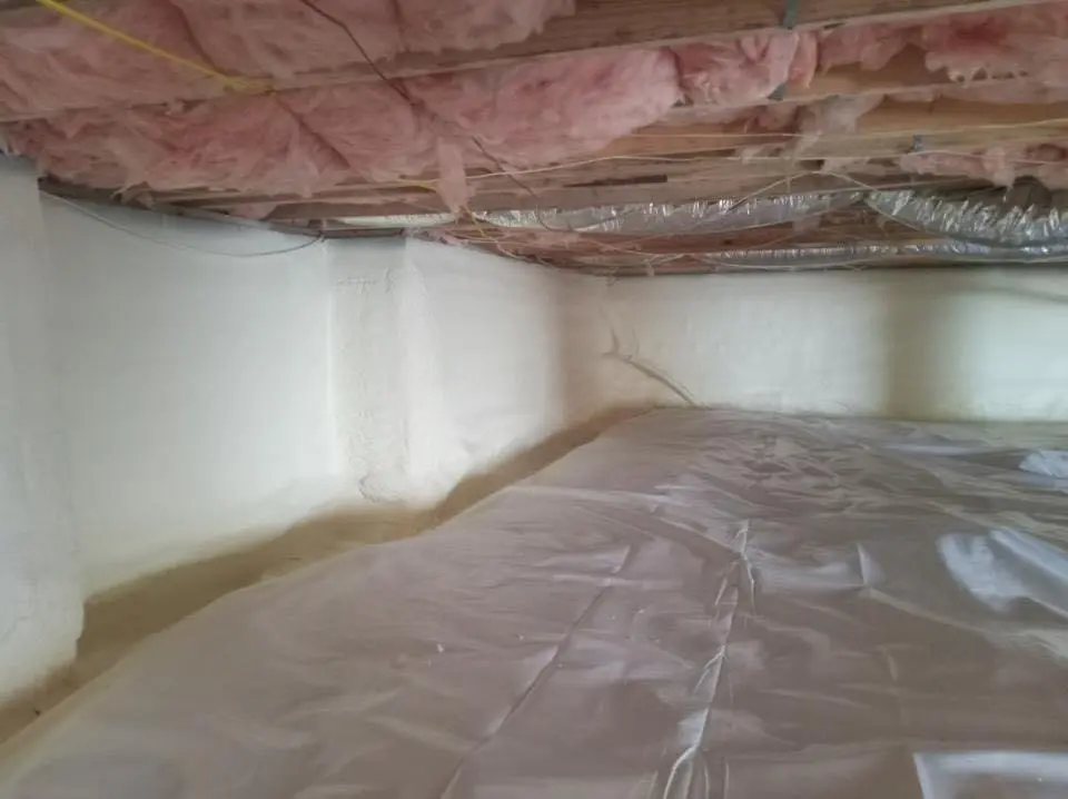 Crawl space encapsulation with closed-cell spray foam for Flat Roof Repair in Riverhead